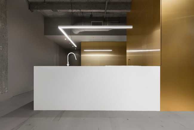 kitchen minimal brass and concrete